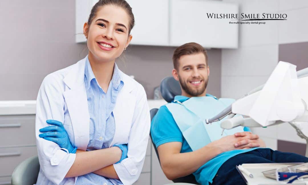 general dentist smiling with patient together general dentist smiling with patient together