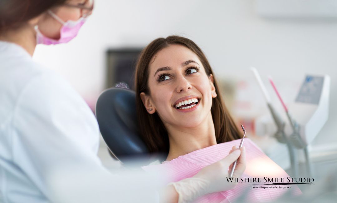 general dentistry woman smiling at doctor general dentistry woman smiling at doctor