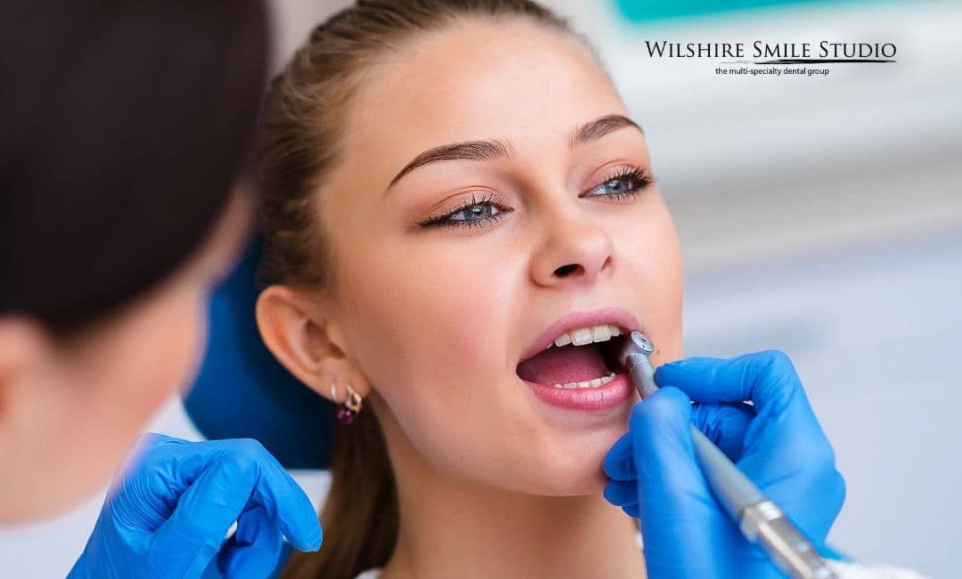 girl getting dental checkup girl getting dental checkup