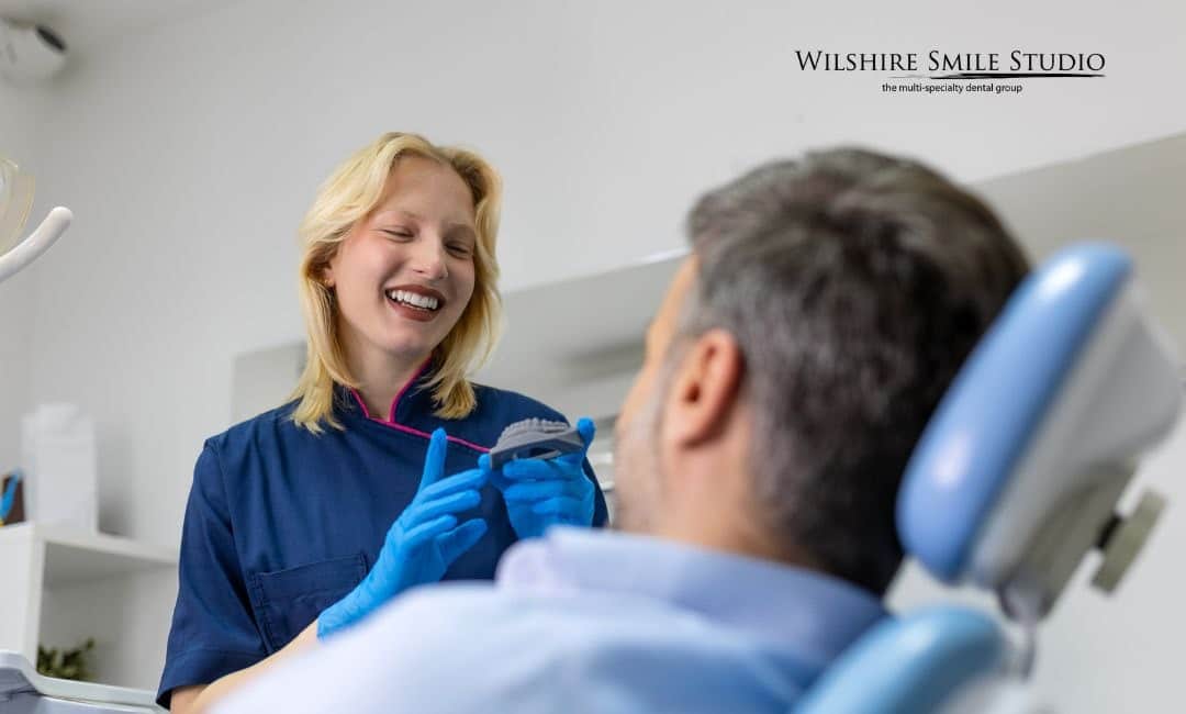 invisalign dentist with male patient invisalign dentist with male patient