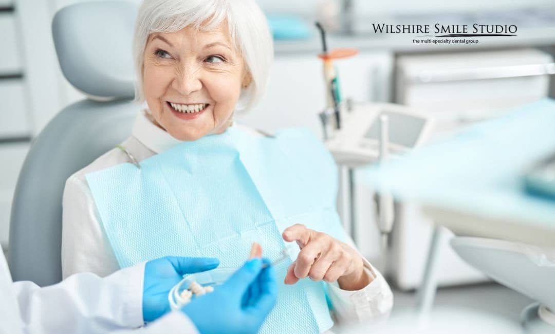 old woman discussing dental implants old woman discussing dental implants