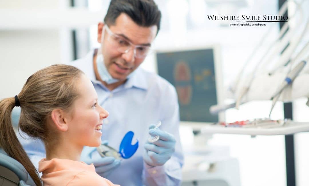 woman getting invisalign woman getting invisalign