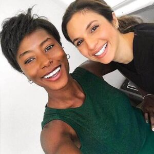 two patients at wilshire smile studio smiling very bright